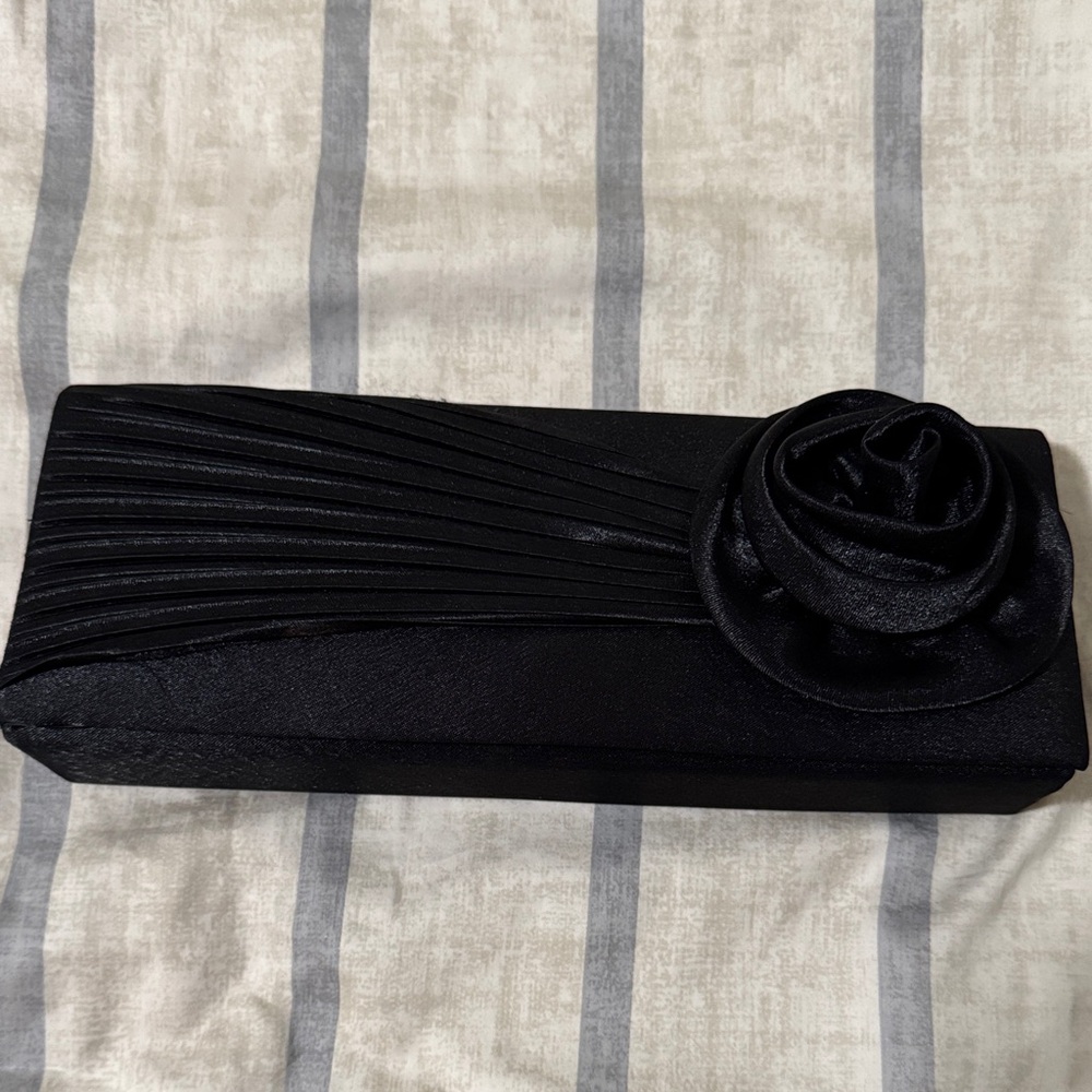Elegant Black Clutch with Floral Accent